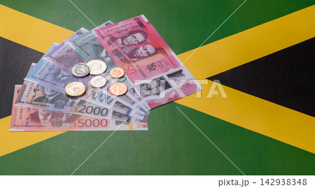Jamaica, Jamaican paper money, dollar banknotes and cent coins for exchange. Jamaica money 142938348
