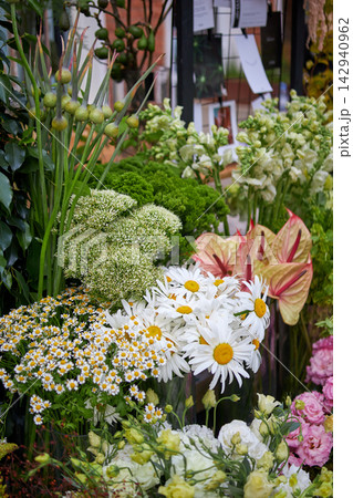 Stalls with flowers and bouquets at local street market Stalls with flowers and bouquets at local street market 142940962