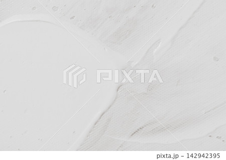 White acrylic paint stroke background featuring thick textured brushwork on artist canvas created for modern abstract fine art or creative minimalist graphic design 142942395