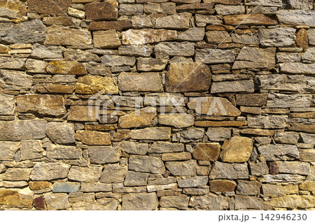 The surface of an stone wall 142946230