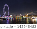 Nighttime view of London Eye over the River Thames 142946482