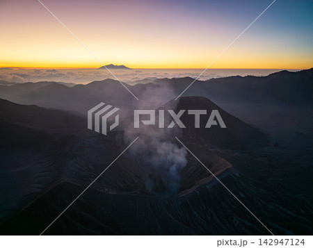 Mount Bromo Volcanic Landscape Above Clouds at Sunset 142947124