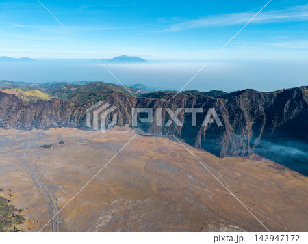 Aerial Sunrise Over Mount Bromo Volcanic Caldera Landscape 142947172