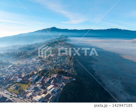 Aerial Daytime View of Mount Bromo Village and Volcanic Caldera 142947185