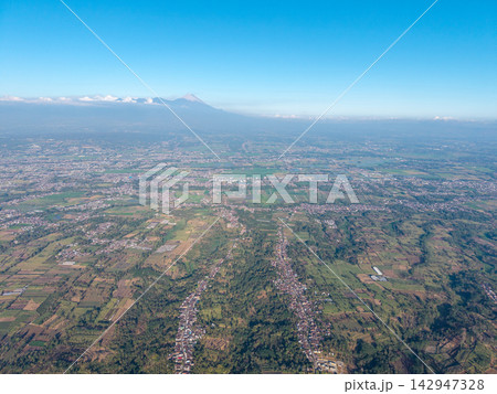 Aerial View of Scenic Landscape with Majestic Mountain in Background Aerial View of Scenic Landscape with Majestic Mountain in Background 142947328