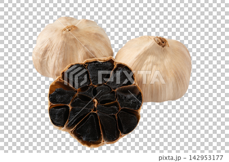 Cutout material of a cross-section of aged black garlic on a transparent background. Cutout material of a cross-section of aged black garlic on a transparent background. 142953177