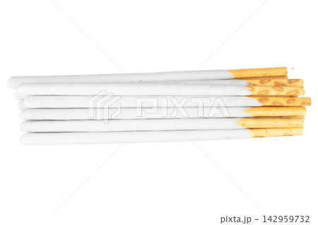 White chocolate coated biscuit sticks isolated on white background White chocolate coated biscuit sticks isolated on white background 142959732