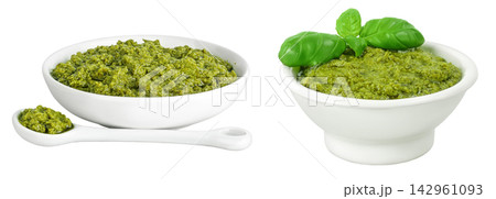 Pesto sauce in ceramic bowl isolated on white background Pesto sauce in ceramic bowl isolated on white background 142961093