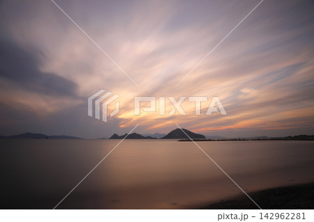 sunset on the beach. Seaside town of Turgutreis and spectacular sunsets. Selective Focus. Long Exposure shoot. tranquility scene. 142962281