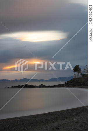 sunset on the beach. Seaside town of Turgutreis and spectacular sunsets. Selective Focus. Long Exposure shoot. tranquility scene. sunset on the beach. Seaside town of Turgutreis and spectacular sunsets. Selective Focus. Long Exposure shoot. tranquility scene. 142962401