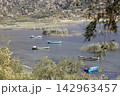 Fishing boats moored along the shore of Lake Bafa in Turkey. Selective Focus. 142963457
