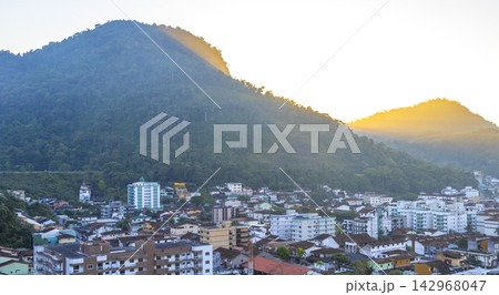 Golden colorful sunrise mountain city Angra dos Reis Brazil. 142968047