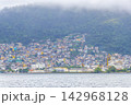 Mountains with favelas houses tropical nature Angra dos Reis Brazil. 142968128