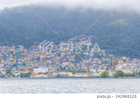 Mountains with favelas houses tropical nature Angra dos Reis Brazil. Mountains with favelas houses tropical nature Angra dos Reis Brazil. 142968128