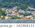 Mountains with favelas houses tropical nature Angra dos Reis Brazil. 142968133