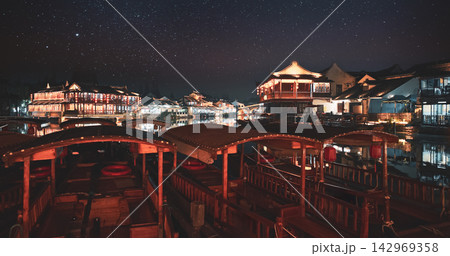 Zhujiajiao Water Town With Wooden Boats Under Starry Night Sky 142969358