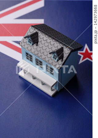Real estate, conceptual background on the New Zealand flag, renting, investing, and business Real estate, conceptual background on the New Zealand flag, renting, investing, and business 142973668