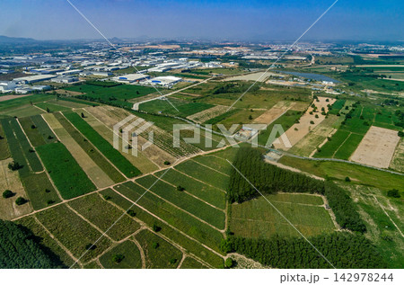 Aerial View of Industrial Park and Farmland Landscape 142978244