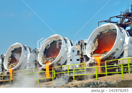 Molten Metal Pouring in Industrial Foundry Steel Production 142978265
