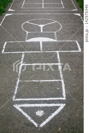Hopscotch Court Painted on Concrete Playground Path Hopscotch Court Painted on Concrete Playground Path 142978340