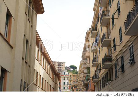 Traditional Residential Street With Apartment Buildings And Balconies Italy 142979868