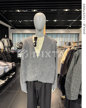 Modern Fashion Store Mannequin Wearing Gray Cardigan And Trousers Modern Fashion Store Mannequin Wearing Gray Cardigan And Trousers 142979869