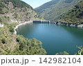 Grandas de Salime, Spain - August 25, 2024: Central Hidroelectrica, Hydroelectric Power Station. The Salime Reservoir is formed by a 128 meters high Gravity dam 142982104