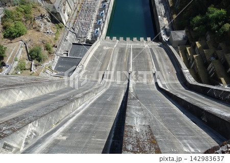Hydroelectric Power Station in Grandas de Salime, Spain. The Salime Reservoir is formed by a 128 meters high Gravity dam Hydroelectric Power Station in Grandas de Salime, Spain. The Salime Reservoir is formed by a 128 meters high Gravity dam 142983637