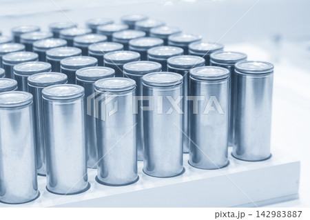A group of cell batteries for EV cars in a blue tone scene 142983887