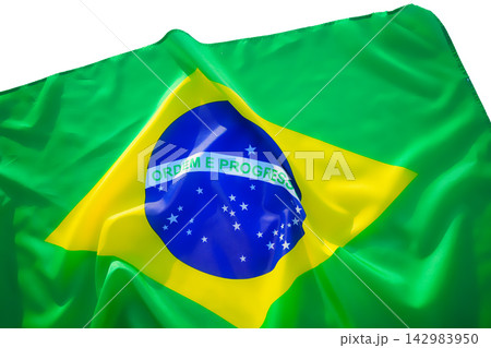 Brazilian flag background. Flag of Brazil waves under sunlight Brazilian flag background. Flag of Brazil waves under sunlight 142983950