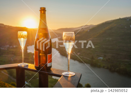 Sparkling Wine Glasses Over Douro River at Sunrise Portugal 142985052