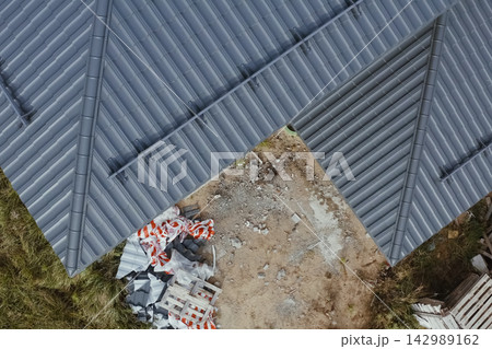 Corrugated metal roof and metal roofing. Modern roof made of metal. 142989162