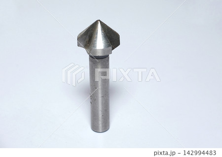 Sturdy metallic router bit for wood carving, sharp focus on cutting edge, white background 142994483