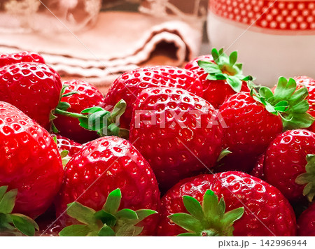 Fresh red strawberries with water drops close up Fresh red strawberries with water drops close up 142996944