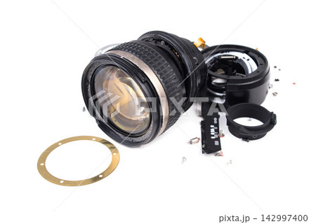Broken Camera Lens Parts Isolated on White Background 142997400