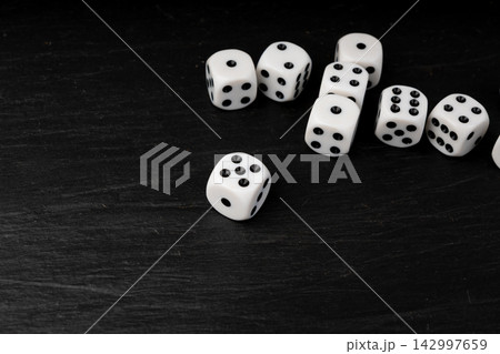 White game dice with black dots White game dice with black dots 142997659