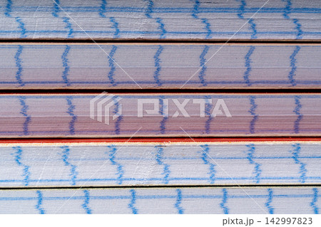 School notebooks stack texture, paper note book on table School notebooks stack texture, paper note book on table 142997823