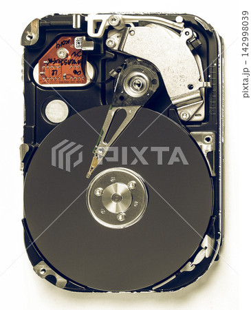 Open Hard Drive with Exposed Platter and Mechanical Read Head Open Hard Drive with Exposed Platter and Mechanical Read Head 142998039