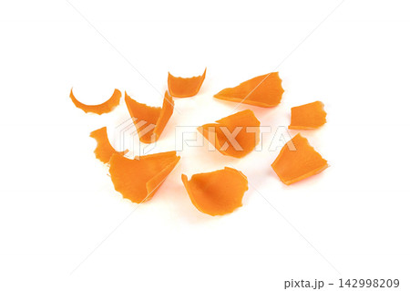 Finely chopped pieces of fresh carrots isolated Finely chopped pieces of fresh carrots isolated 142998209