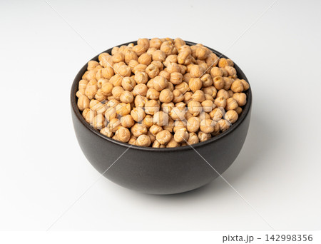 Chickpea, chick pea pile, dry Cicer arietinum fruits, raw Bengal gram legume, garbanzo beans Chickpea, chick pea pile, dry Cicer arietinum fruits, raw Bengal gram legume, garbanzo beans 142998356