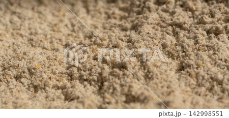 Wheat flour powder textured background, spelt grain dust pattern 142998551