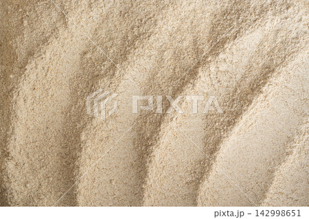 Wheat flour powder textured background, spelt grain dust pattern Wheat flour powder textured background, spelt grain dust pattern 142998651