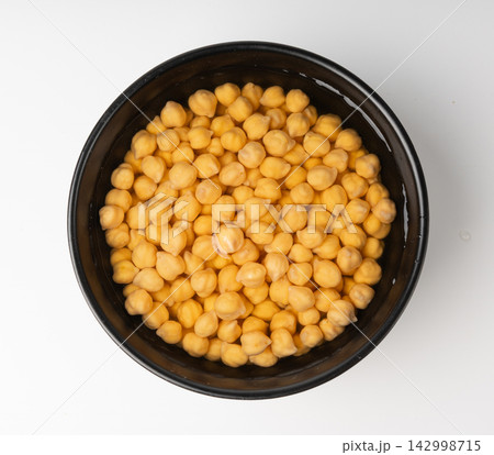 Soaked chickpeas, chick pea in water, swollen wet Cicer arietinum fruits, garbanzo beans cooking 142998715