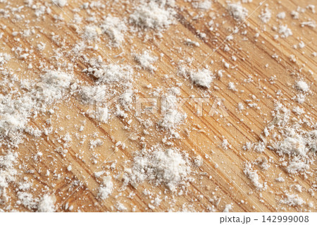 Wheat flour powder textured background, spelt grain dust pattern Wheat flour powder textured background, spelt grain dust pattern 142999008
