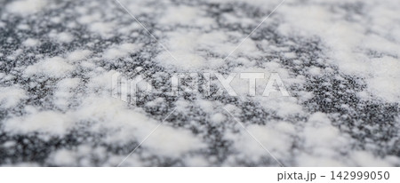 Wheat flour powder textured background, spelt grain dust pattern 142999050