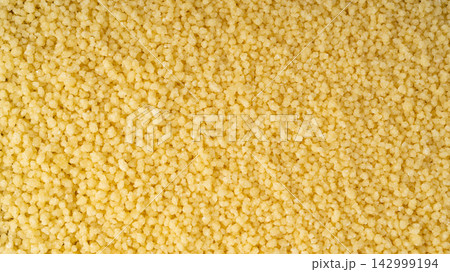 Couscous texture background close up 142999194