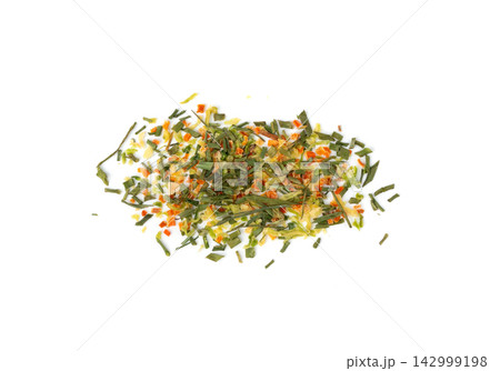 Dried vegetable mix isolated. Dehydrated greens, onion, carrot pieces, seasoning chips, flakes Dried vegetable mix isolated. Dehydrated greens, onion, carrot pieces, seasoning chips, flakes 142999198