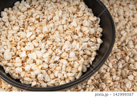 Puffed buckwheat textured background Puffed buckwheat textured background 142999387