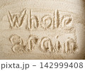 Wheat flour powder textured background, spelt grain dust pattern 142999408