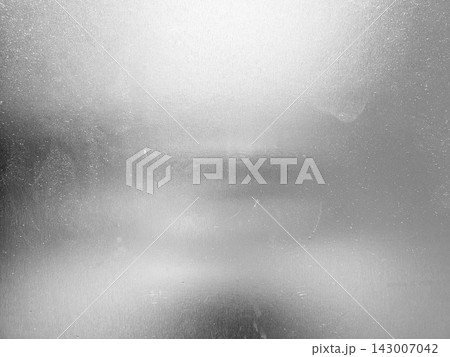 Abstract brushed aluminum film texture background with heavy scratches and dust particles. 143007042